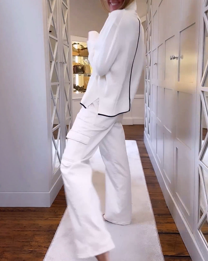 Pull avec le cou haut et les manches longues