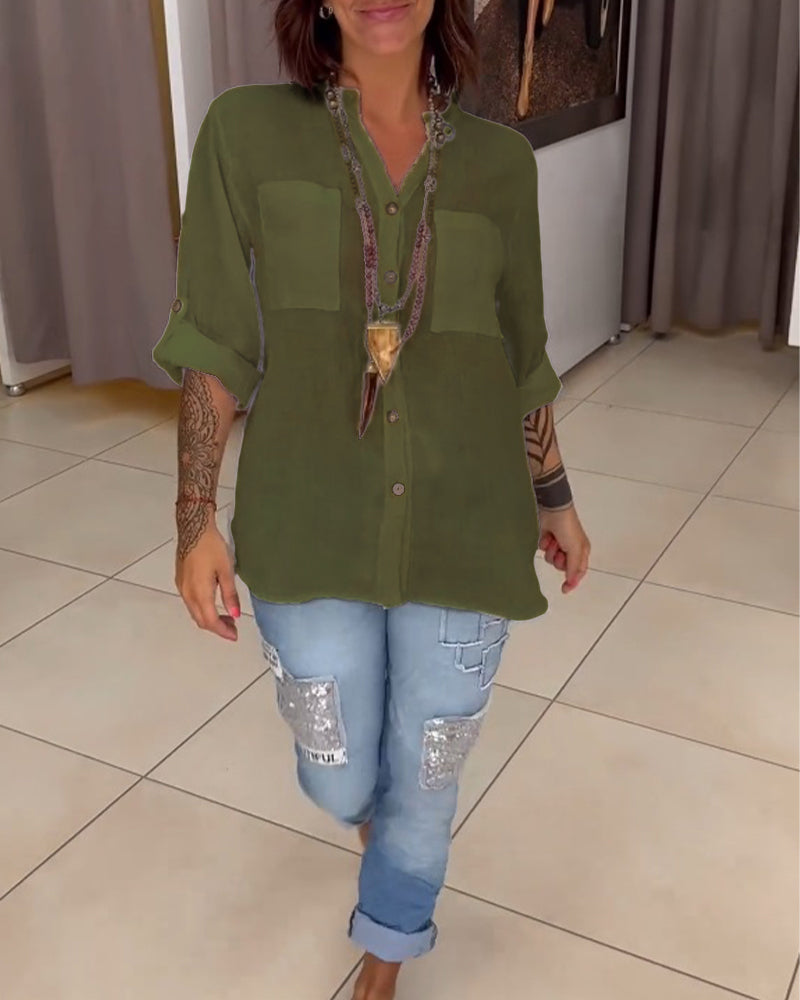 Chemise de couleur unie avec poches et boutons simples